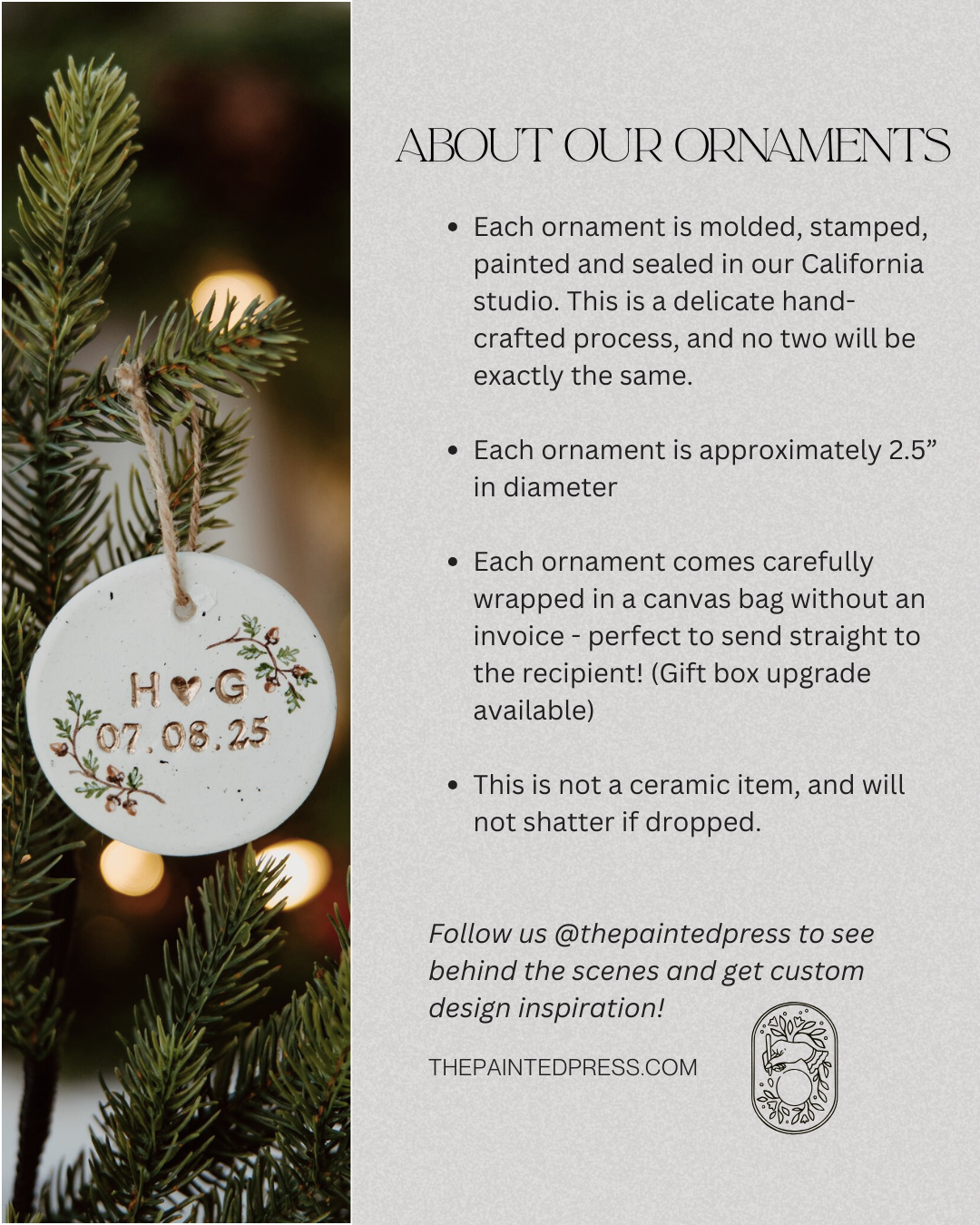 Decorative ornament with engraved text on a branch with lights and greenery.